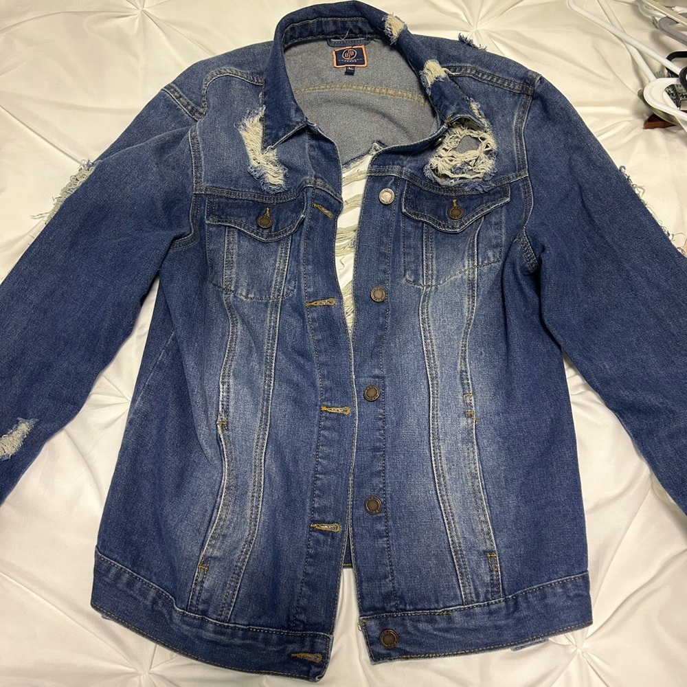 Ripped denim jacket